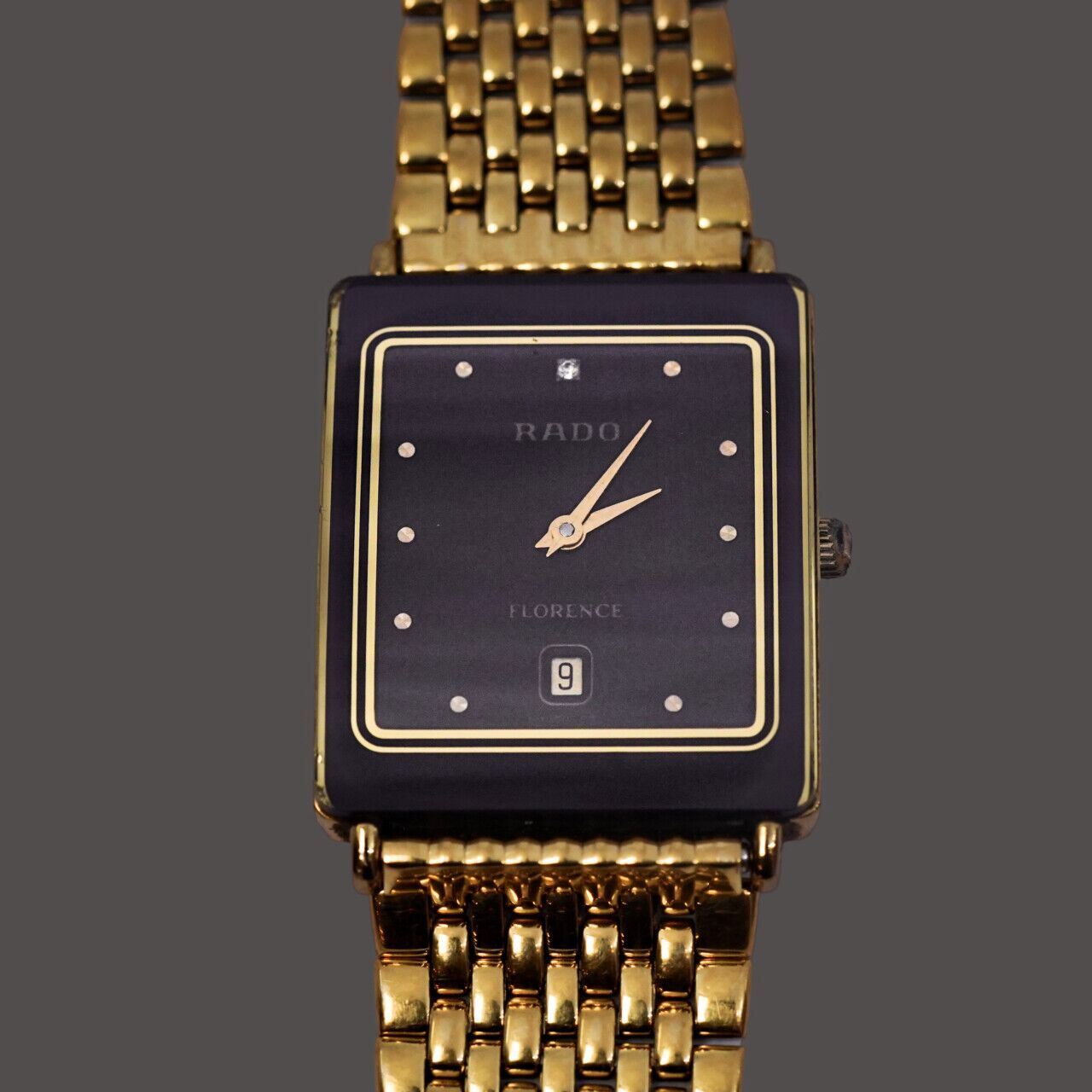 Unisex Rado Florence Black & Gold Quartz Watch 160.3605.2N